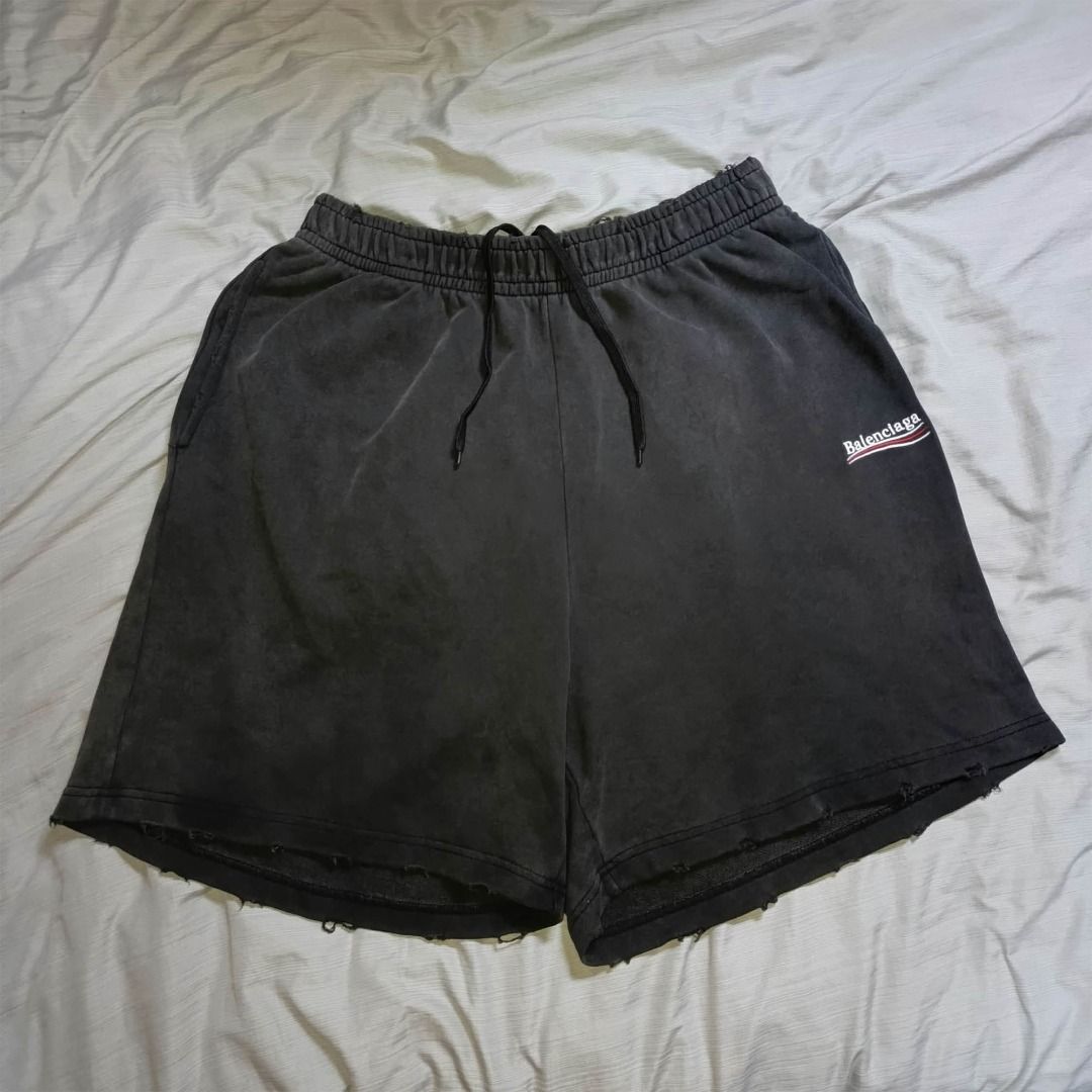 Balenciaga Wardrobe Unisex Shorts (Category: Shorts) located in Davao. Submitted by 3hunna_thrift (Listing ID 1463660396, Image 1). Description: - Balenciaga shorts from the Wardrobe collection - Unisex fit, suitable for everyone - Stylish grey wash with a trendy distressed hem - Features the iconic Balenciaga logo embroidered on the front - Ideal for everyday casual wear.