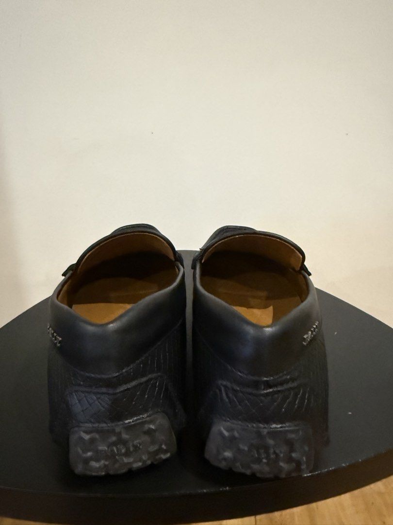 Bally Black Leather Embossed Loafers (Category: Dress Shoes) located in Quezon City. Submitted by pathdz (Listing ID 1463583334, Image 3). Description: - Classic black Bally loafers - Genuine leather with subtle embossed pattern - Timeless penny loafer design - Easy slip-on style for comfort - Versatile for both casual and formal wear - Purchased in Italy (No more Box) - Fitted only.