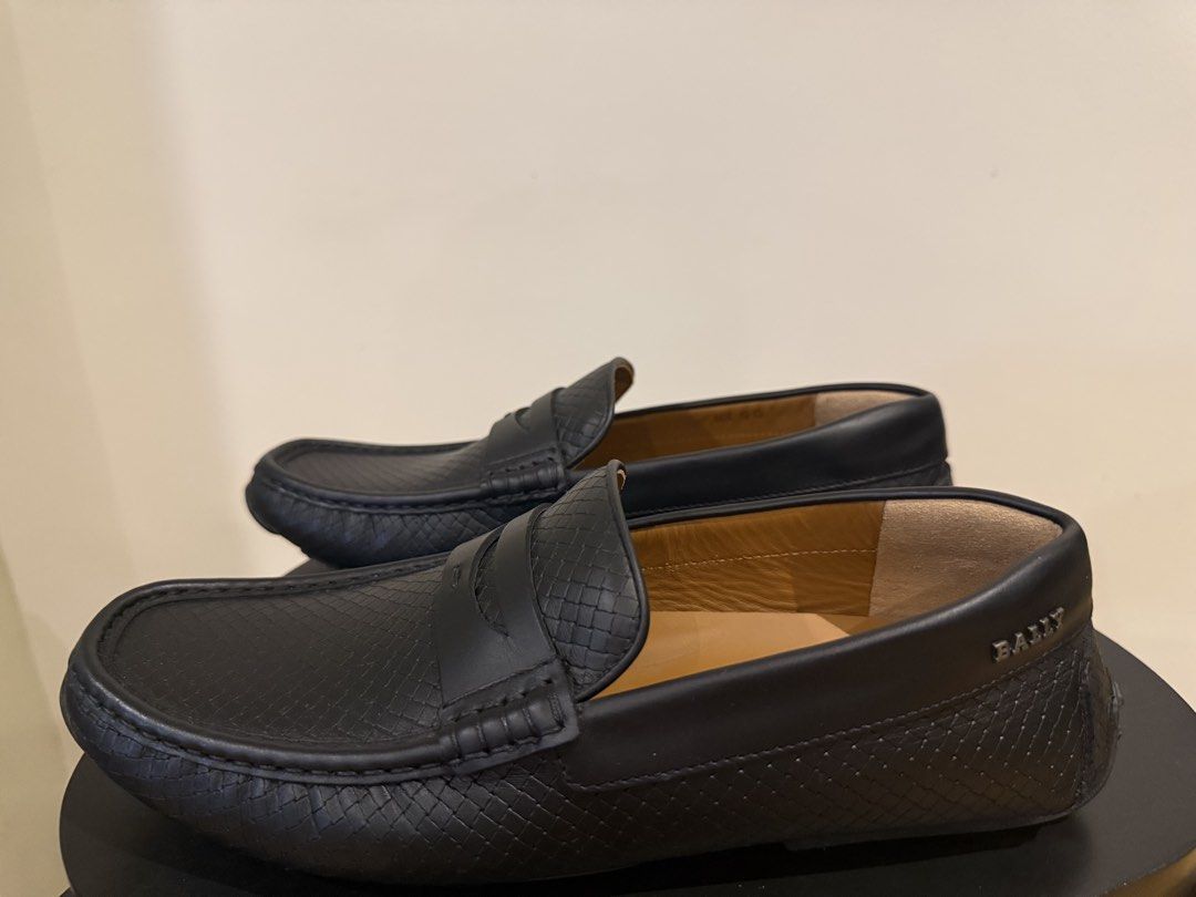 Bally Black Leather Embossed Loafers (Category: Dress Shoes) located in Quezon City. Submitted by pathdz (Listing ID 1463583334, Image 2). Description: - Classic black Bally loafers - Genuine leather with subtle embossed pattern - Timeless penny loafer design - Easy slip-on style for comfort - Versatile for both casual and formal wear - Purchased in Italy (No more Box) - Fitted only.
