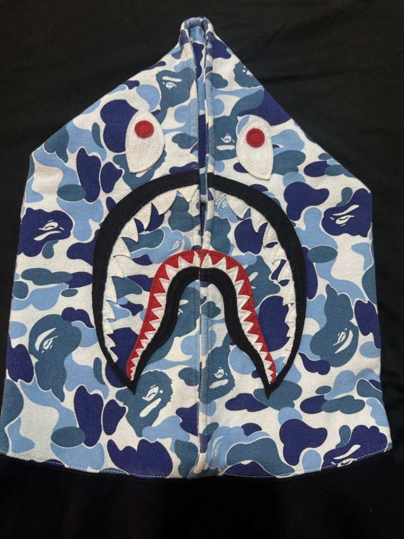 AUTHENTIC A Bathing Ape BAPE Shark Pullover Hoodie ABC Blue Camo (Category: Hoodies) located in Caloocan City. Submitted by ehxxxx (Listing ID 1463665414, Image 1). Description: Bought in BAPE Harajuku, personal used 25x30 One of the only authentic bape hoodies listed Great condition Perfect chenille on WGM Can send detailed pics Negotiable Mandaluyong Pm me.
