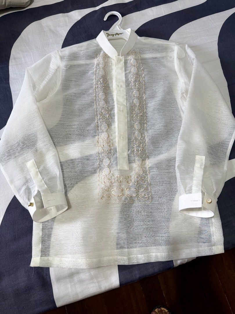 Barong Tagaloflg (Category: Coats, Jackets and Outerwear) located in Las Pinas. Submitted by rizabcp (Listing ID 1463608477, Image 2). Description: Preloved in mint condition used twice in Buwan ng Ng Wkis size 16 Bought in Kultura SM price ng Barong sa Kultura ₱3000, sale pa as of today 9/24/2026 please see pictures for the exact measurement plus sf.