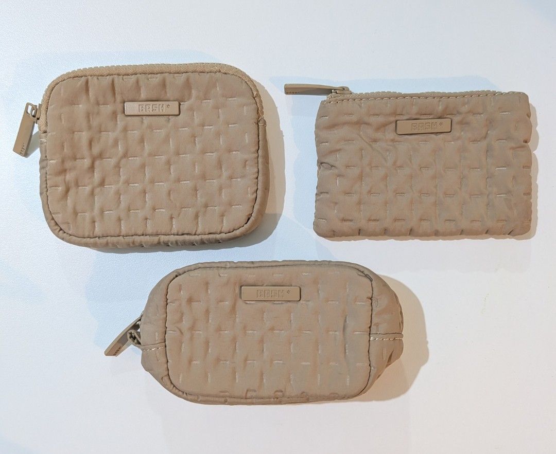 BASH Quilted Coin Pouch Purse Set - Beige (Category: Purses & Pouches) located in Manila. Submitted by cart_rd (Listing ID 1463590630, Image 1). Description: - Set of 3 quilted coin purses from BASH - Neutral beige color - Ideal for organizing coins, cards, or makeup - Smooth working zippers - Perfect for travel or everyday use - use once only .