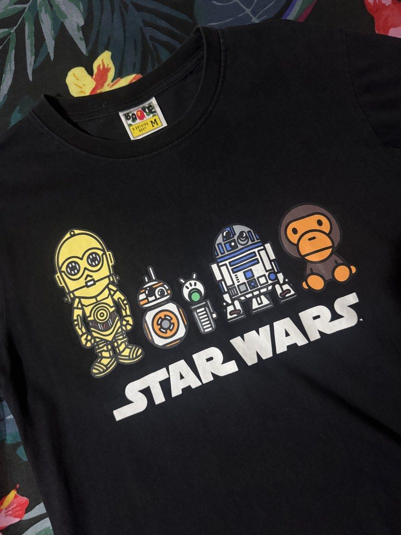 Bathing Ape x Star Wars Droids (Category: Tshirts & Polo Shirts ) located in Angono. Submitted by brydeville (Listing ID 1463688585, Image 2). Description: Bathing Ape x Star Wars Droids Medium Size Fitted only, a bit small for me. 700 only First to pay gets the item. 24hrs reservation. MOP: Bank xfer or Maya/Gcash. MOD: Grab/Lala or LBC. Item Location 📍Binangonan Rizal Thank you! 🫶.