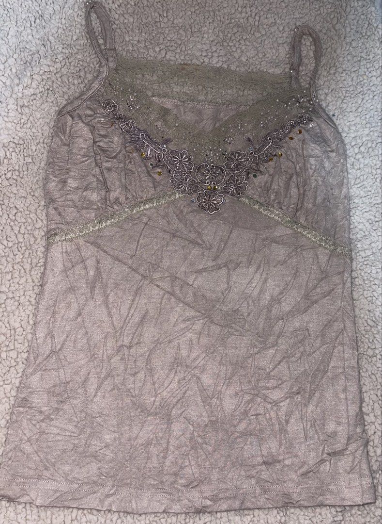 Beaded Lace Trim Camisole Top (Category: Sleeveless) located in Manila. Submitted by fastforest_65f95b (Listing ID 1463567260, Image 2). Description: - Cute camisole top - Intricate beaded lace detailing on neckline - Adjustable straps for a perfect fit - Light, neutral color with a slight sheen - Versatile: great for layering or wearing on its own.