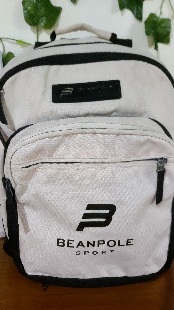 Beanpole Sport Backpack (Category: Backpacks) located in Baguio. Submitted by phoeberose33384 (Listing ID 1463739296, Image 2). Description: - Cream and black Beanpole Sport backpack - Multiple interior compartments for organization - Front zip pocket - Side mesh pockets - Adjustable straps for comfort - Ideal for school or everyday use.