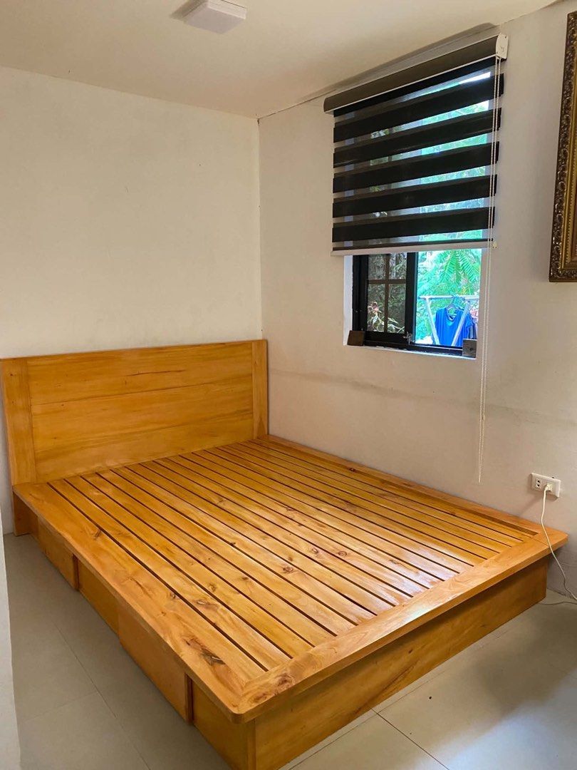 Bed Frame Solid Wood (Category: Bed Frames & Mattresses) located in Rizal. Submitted by veryja82 (Listing ID 1463717067, Image 3). Description: custom made solid wood bed frame made from mahogany wood. size full double 54x75 with box 2 box on both side. pick up or via courier lalamove.