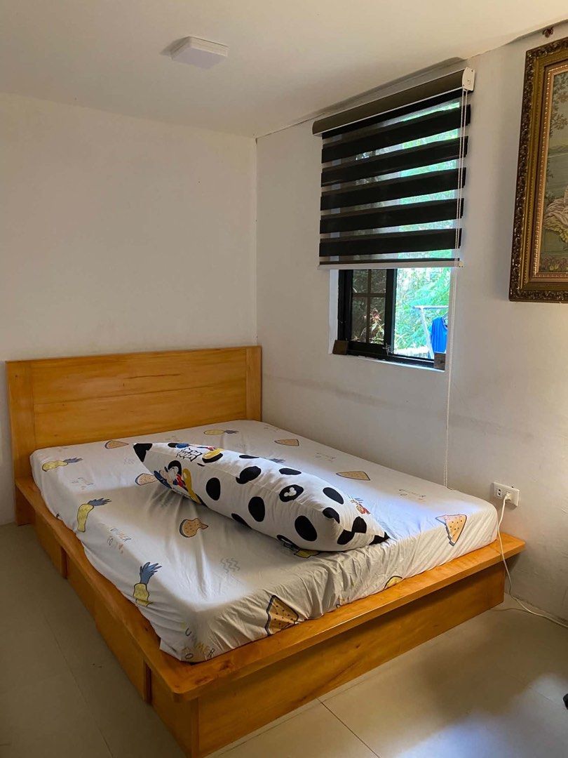 Bed Frame Solid Wood (Category: Bed Frames & Mattresses) located in Rizal. Submitted by veryja82 (Listing ID 1463717067, Image 2). Description: custom made solid wood bed frame made from mahogany wood. size full double 54x75 with box 2 box on both side. pick up or via courier lalamove.