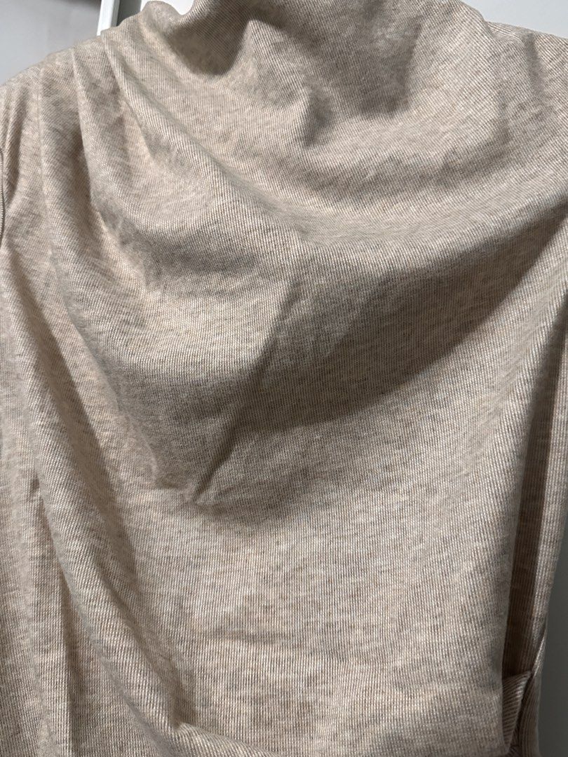 Beige Asymmetrical Drape Neck Sleeveless Top (Category: Sleeveless) located in Caloocan City. Submitted by tiannnaaa (Listing ID 1463684676, Image 2). Description: - fixed price posted, won’t reply to hagglers .