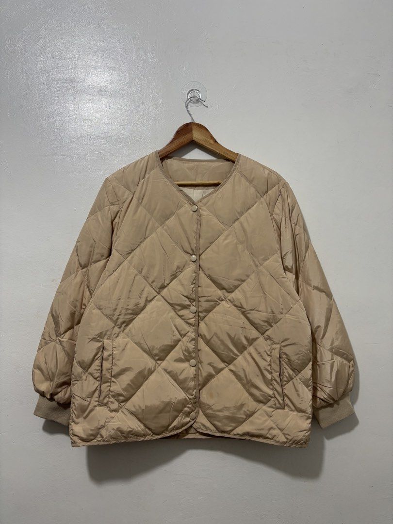 Beige Quilted Puffer Jacket Women Medium (Category: Coats, Jackets and Outerwear) located in Balanga. Submitted by winterlab_ph (Listing ID 1463665553, Image 3). Description: Code: C025 Width: 22.5 Length: 26 Shoulders: 17 Sleeves: 22.5 : needs wash.