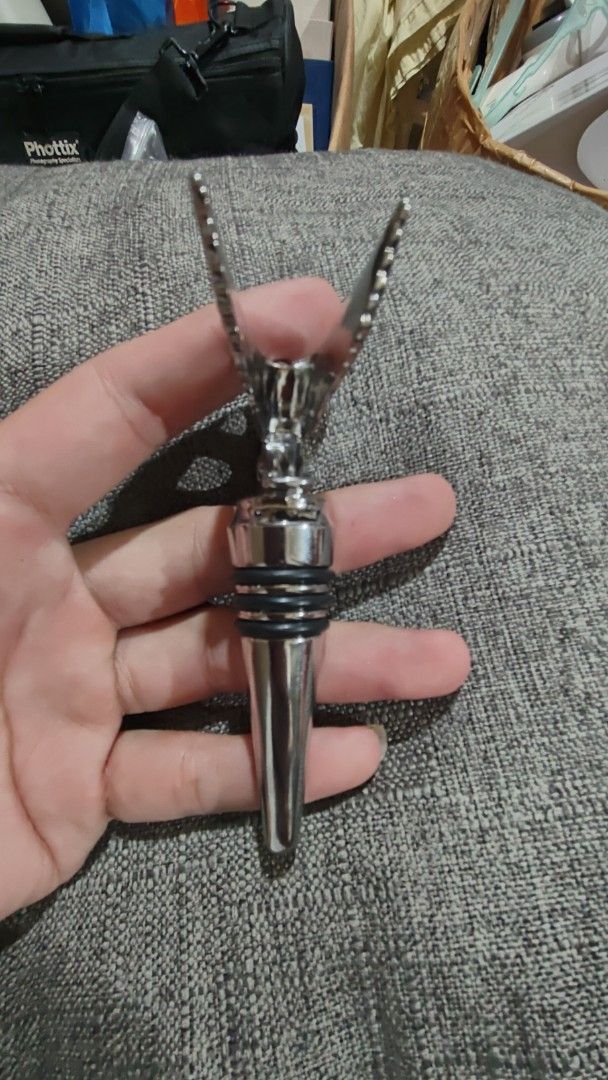 chrome plated Bentley Winged B Bottle Stopper (Category: Vintage Collectibles) located in Baguio. Submitted by maryhazel.22 (Listing ID 1463668582, Image 3). Description: - Authentic Bentley Winged B logo bottle stopper - Sleek, shiny chrome finish - Comes with a soft black velvet pouch -no box - Ideal for Bentley enthusiasts and as a unique gift - Keeps wine fresh with a touch of luxury.