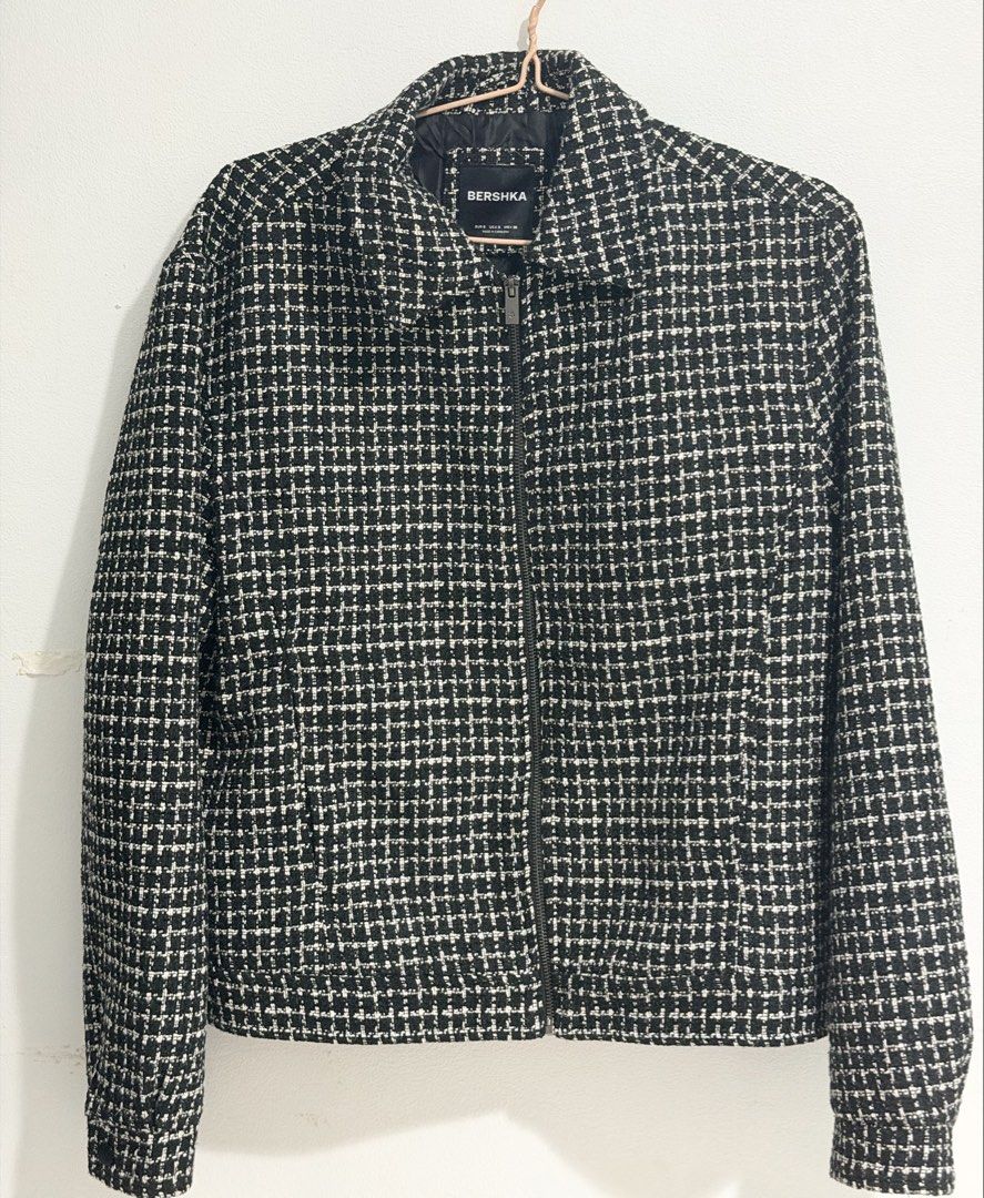 Bershka Black and White Checked Bomber Jacket (Category: Coats, Jackets and Outerwear) located in Manila. Submitted by aliumcepa (Listing ID 1463677226, Image 1). Description: - Stylish Bershka jacket - Classic black and white check pattern - Convenient zip-up front - Ideal for casual outfits - Great for cooler weather - Versatile: pairs well with jeans or trousers.