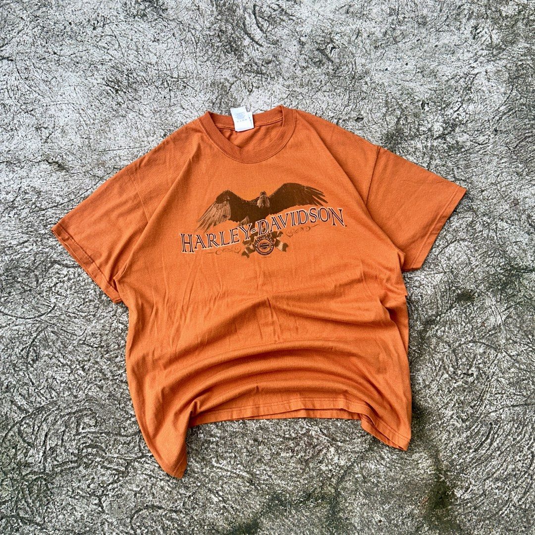 Screamin’ Eagle 🦅 | Vintage Harley Davidson (Category: Tshirts & Polo Shirts ) located in Manila. Submitted by thelocalrackph (Listing ID 1462765110, Image 2). Description: 2007 Harley-Davidson “Appalachian” Screamin’ Eagle Graphic Tee - Era / Copyright: Official ©2007 H-D Licensed Piece - Size: XL (Wide, relaxed drop-shoulder cut) - Colorway: Faded Rust / Safety Orange Details: - Front: Soaring bald eagle centerpiece framed by outlined serif le