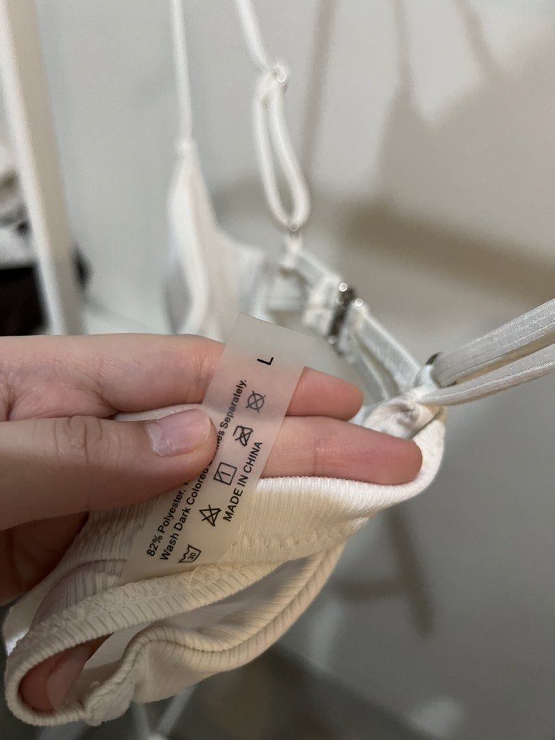 Bikini top (white) (Category: Bikinis & Swimsuits) located in Quezon City. Submitted by styleandcomfort (Listing ID 1463711378, Image 2). Description: Never worn but has slight stain Message me for inquiries 😊.