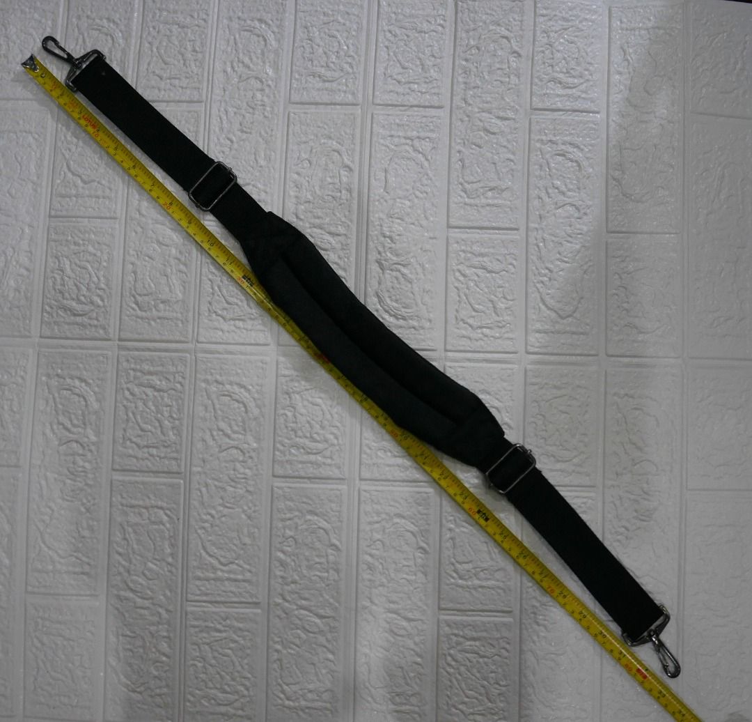 Black Adjustable Curved Padded Bag Shoulder Strap (Category: Shoulder Bags) located in Valenzuela. Submitted by cletini (Listing ID 1463689157, Image 3). Description: Ideal for laptops, Dslr/ bulky cameras, heavy equipments or item,s Black adjustable replacement shoulder strap with a curved padded shoulder section designed to sit comfortably on the shoulder. Features sturdy nylon webbing, adjustable sliders, and silver-tone swivel hooks. 📏 Appro