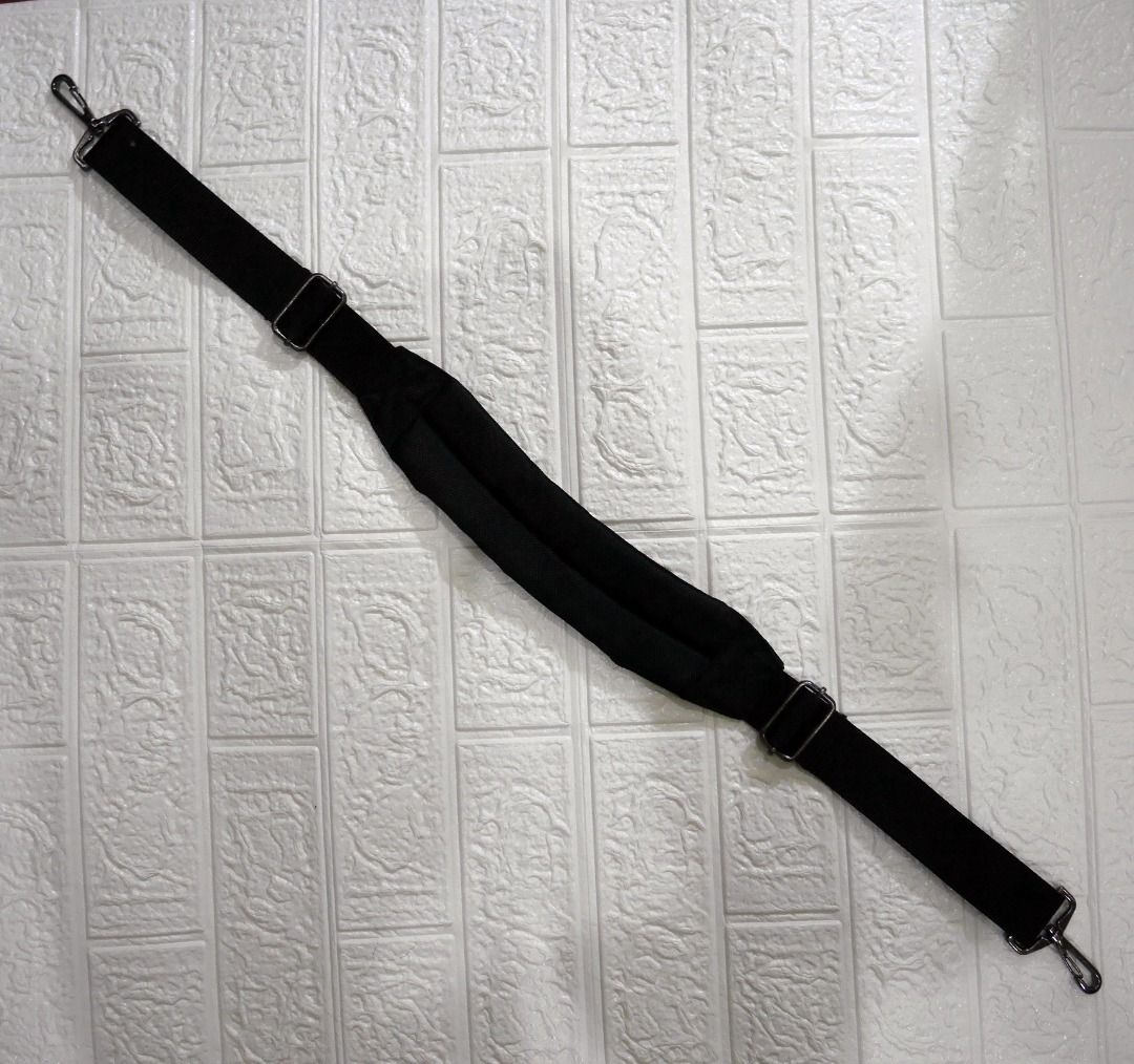 Black Adjustable Curved Padded Bag Shoulder Strap (Category: Shoulder Bags) located in Valenzuela. Submitted by cletini (Listing ID 1463689157, Image 2). Description: Ideal for laptops, Dslr/ bulky cameras, heavy equipments or item,s Black adjustable replacement shoulder strap with a curved padded shoulder section designed to sit comfortably on the shoulder. Features sturdy nylon webbing, adjustable sliders, and silver-tone swivel hooks. 📏 Appro