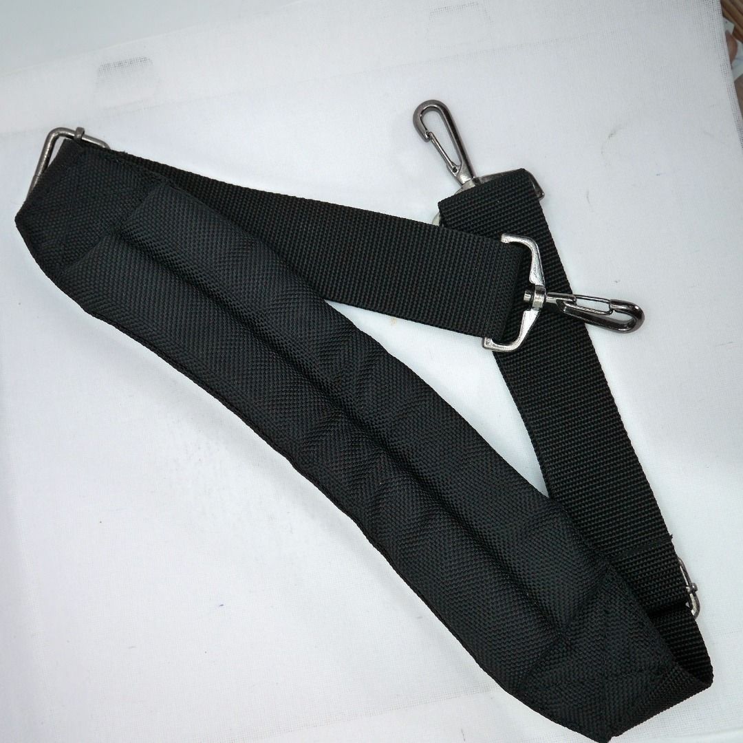 Black Adjustable Curved Padded Bag Shoulder Strap (Category: Shoulder Bags) located in Valenzuela. Submitted by cletini (Listing ID 1463689157, Image 1). Description: Ideal for laptops, Dslr/ bulky cameras, heavy equipments or item,s Black adjustable replacement shoulder strap with a curved padded shoulder section designed to sit comfortably on the shoulder. Features sturdy nylon webbing, adjustable sliders, and silver-tone swivel hooks. 📏 Appro