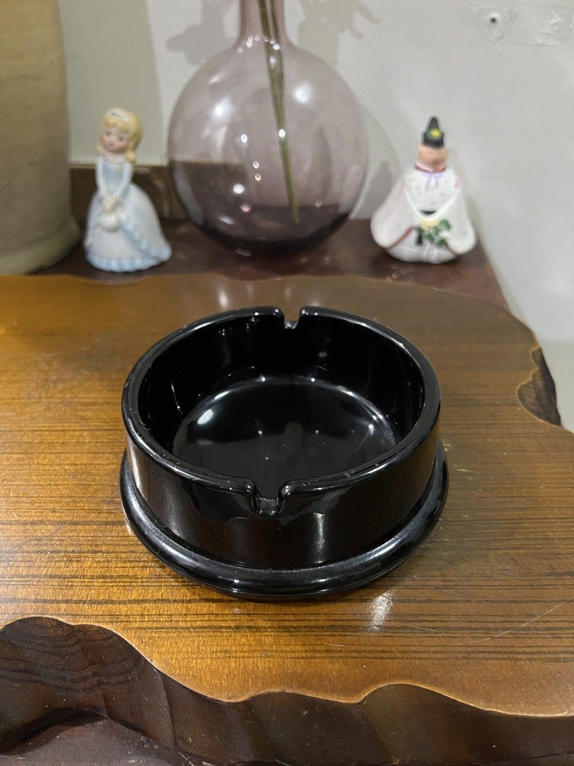 Black Ashtray with Round Base (Category: Vases & Decorative Bowls) located in Taguig. Submitted by minmin_parker (Listing ID 1463695687, Image 2). Description: - Sleek black ashtray with a classic round base. - Features convenient notches to hold cigarettes. - Versatile for both indoor and outdoor spaces. - Effortless to clean for everyday use. - An essential and practical accessory for any smoker..