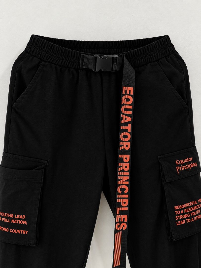Black Cargo Pants with Belt - Size 26-32 (Category: Jeans) located in La Trinidad. Submitted by honeysplushies2 (Listing ID 1463663841, Image 2). Description: - Stylish black cargo pants - "EQUATOR PRINCIPLES" printed on the cool belt and pockets - Multiple pockets for ample storage - Comfortable elastic waistband - Fits waist sizes 26-32 inches - Length: 36 inches - Ideal for casual wear.