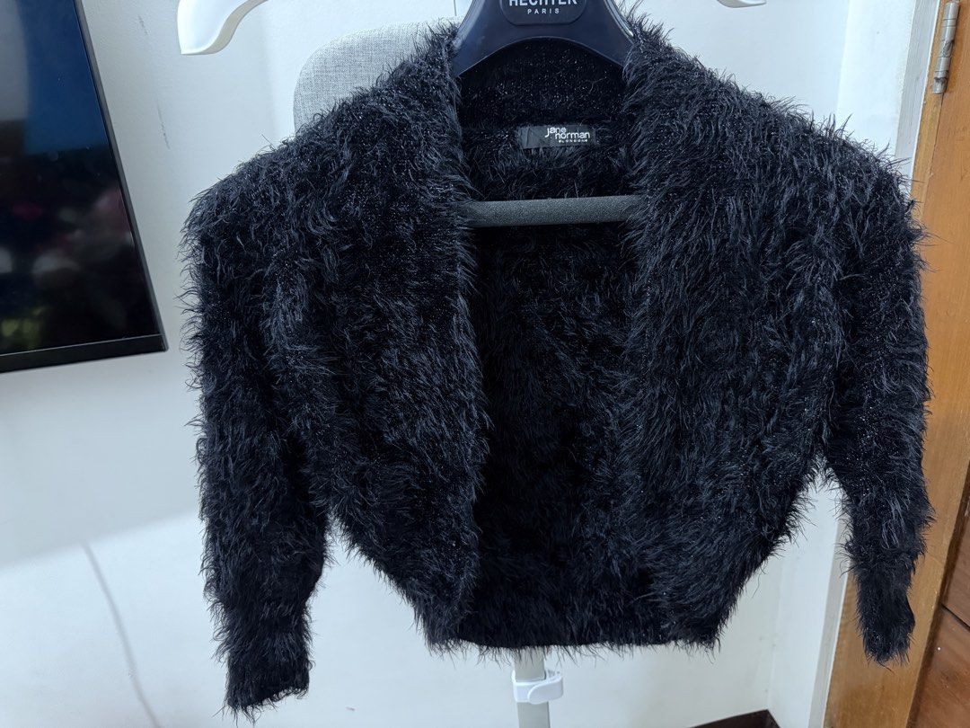 Black Fuzzy Cropped Cardigan (Category: Coats, Jackets and Outerwear) located in Makati City. Submitted by petite_preloved2 (Listing ID 1463560597, Image 1). Description: - Can Fit XS- Semi Medium - Warm enough for spring season - Soft and comfy fabric.