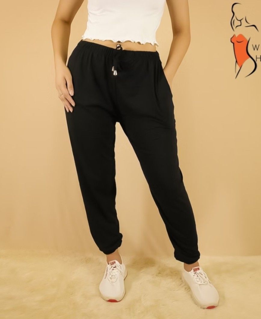 Black Jogger Pants with Drawstring (Category: Other Bottoms) located in Rizal. Submitted by reese511 (Listing ID 1463659031, Image 1). Description: - Comfy black jogger pants - Elastic waistband with drawstring tie - Two side pockets - Cuffed ankles - Ideal for lounging or casual wear - Versatile: pairs easily with any top.