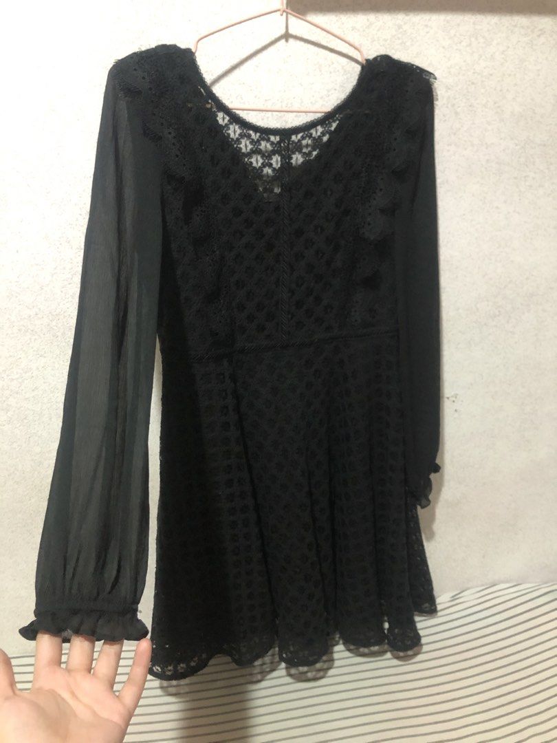 Black Lace Long Sleeve Mini Dress (Category: Dresses) located in Butuan. Submitted by prettyfinds_ph (Listing ID 1463594940, Image 2). Description: - Elegant black mini dress - Long sleeves with ruffled cuffs - Intricate all-over lace detailing - Flattering V-neckline - Convenient tie detail at the back - Ideal for parties and night outs.