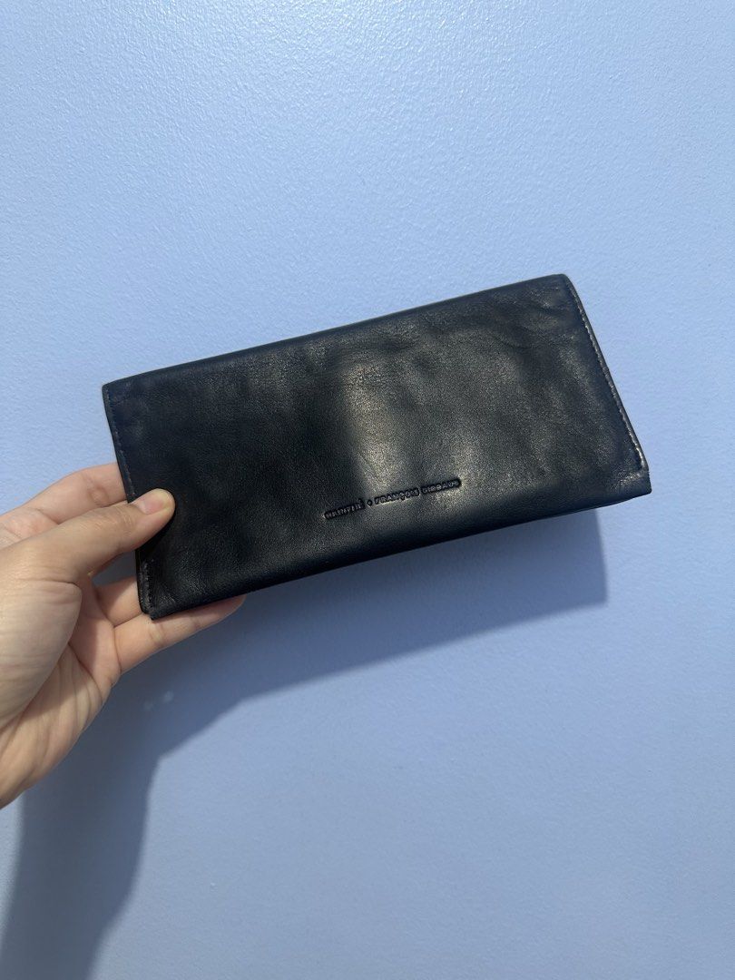Black Leather Wallet Girbaud (Category: Wallets & Card holders) located in Marikina City. Submitted by ahhhmayzing (Listing ID 1463638602, Image 1). Description: - Genuine black leather wallet with a comfortable, worn-in feel. - Multiple card slots for all your cards. - Clear ID window for easy access..