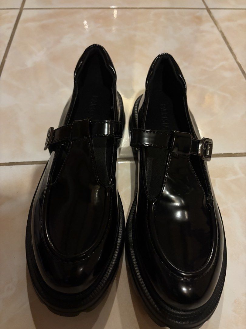 Black Loafers Brand New (Category: Heels) located in Iloilo. Submitted by drrchl (Listing ID 1463652161, Image 3). Description: - Black patent Mary Jane shoes - Features a buckle strap - Chunky platform sole - Super cute and versatile - Great for school or casual wear - Easy to pair with dresses or pants - Selling because wrong size.