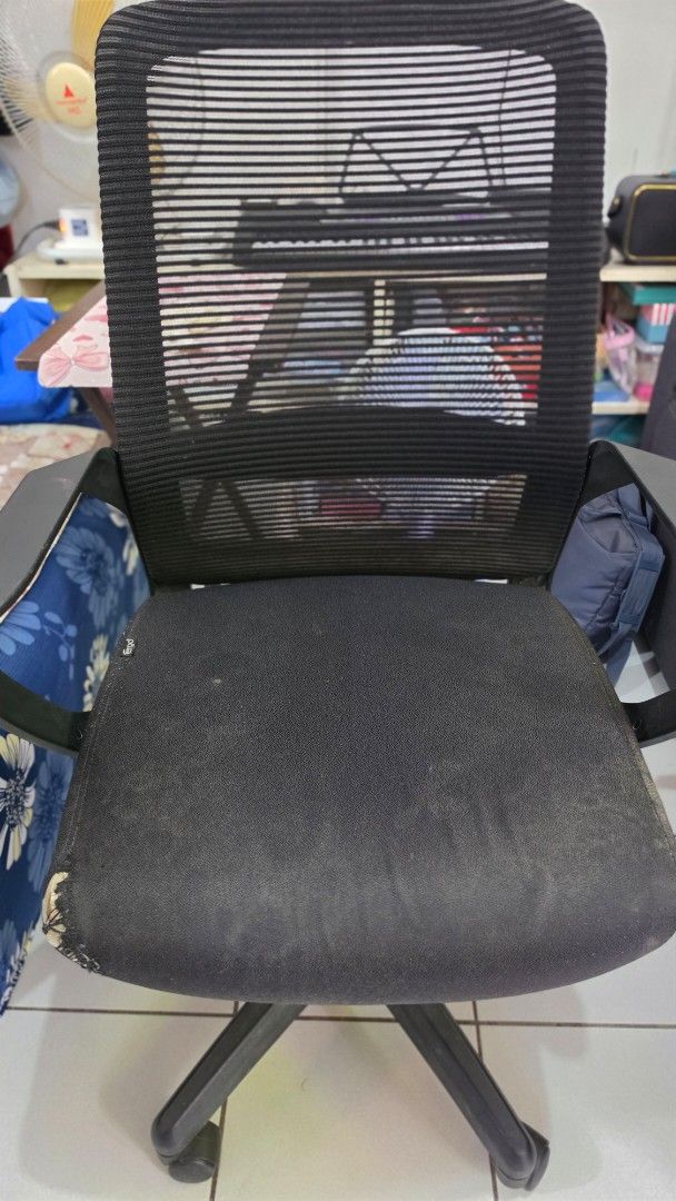 Black Mesh Back Office Chair with Padded Seat (Category: Office Furniture & Fixtures) located in Paranaque City. Submitted by dlc.r (Listing ID 1463578613, Image 1). Description: - ErgoHome Brand Black office chair - Breathable mesh back for comfort - Padded seat for extended sitting - Smooth-rolling wheels on a stable 5-star base - Minor signs of wear on seat cushion - Fully functional and ready for use - Height Adjustable Seat.