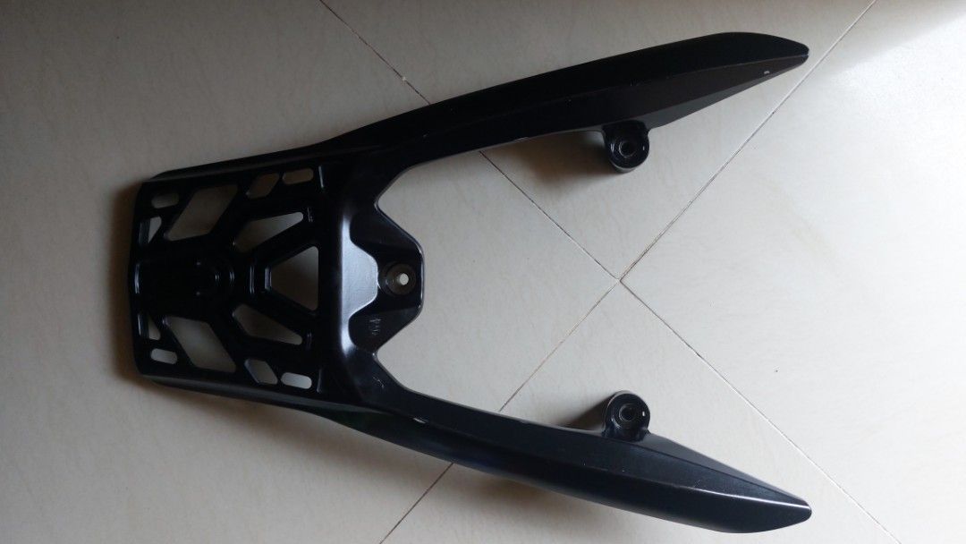 Black Motorcycle Rear Luggage Rack Carrier (Category: Bicycles) located in Quezon City. Submitted by christopher.torio18 (Listing ID 1463701852, Image 1). Description: Honda click Raven bracket secondhand Sale for only 450.