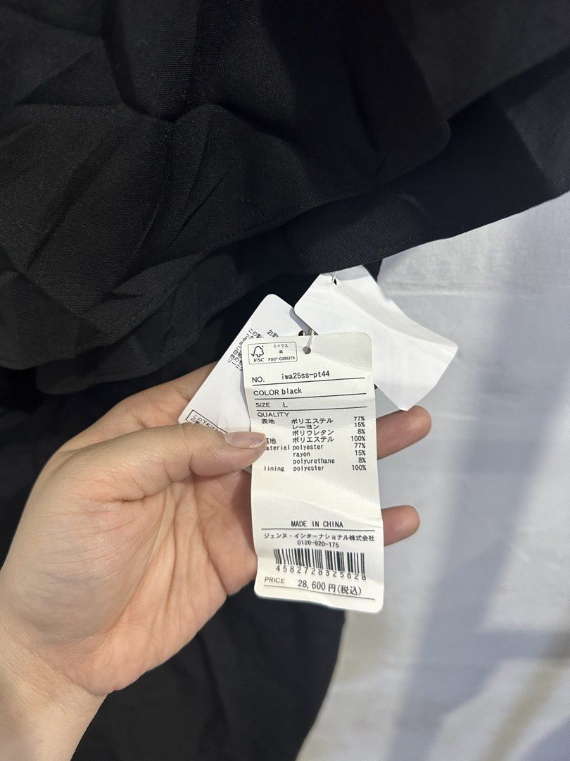 Black Off-Shoulder Ruffle Jumpsuit (Category: Jumpsuits) located in San Jose del Monte. Submitted by bizzybeebyhgc (Listing ID 1463641946, Image 3). Description: - Elegant black jumpsuit - Flattering off-shoulder ruffle detail - Convenient back zipper closure - Functional side pockets - Comfortable polyester blend fabric - Versatile for dressing up or down.