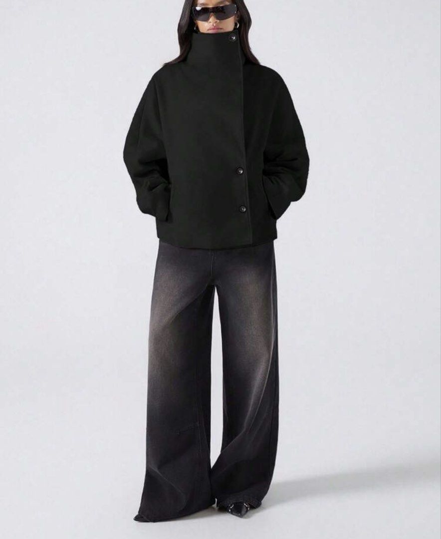 Black Oversized Collar Button Up Jacket (Category: Coats, Jackets and Outerwear) located in Paranaque City. Submitted by declutterr__ (Listing ID 1463613233, Image 2). Description: - Cool black jacket - Unique oversized collar - Can be worn buttoned up or open - Two front buttons and pockets - Voluminous sleeves - Ideal for layering over tops or dresses - Creates a chic, minimalist aesthetic.