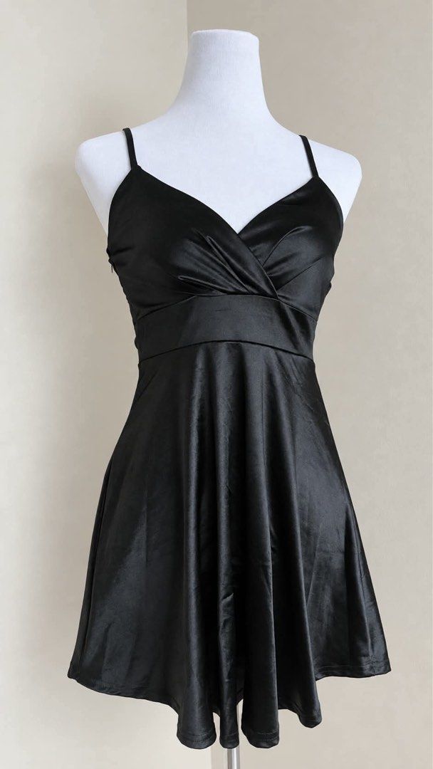 Black Satin V-Neck Spaghetti Strap Mini Dress (Category: Dresses) located in Mabalacat. Submitted by autumn.apparel (Listing ID 1463686281, Image 1). Description: Chic satin black mini dress with V-neck, spaghetti straps, cinched waist, and flowy A-line skirt. Has a slight sheen. Perfect for parties or nights out. Side zipper..
