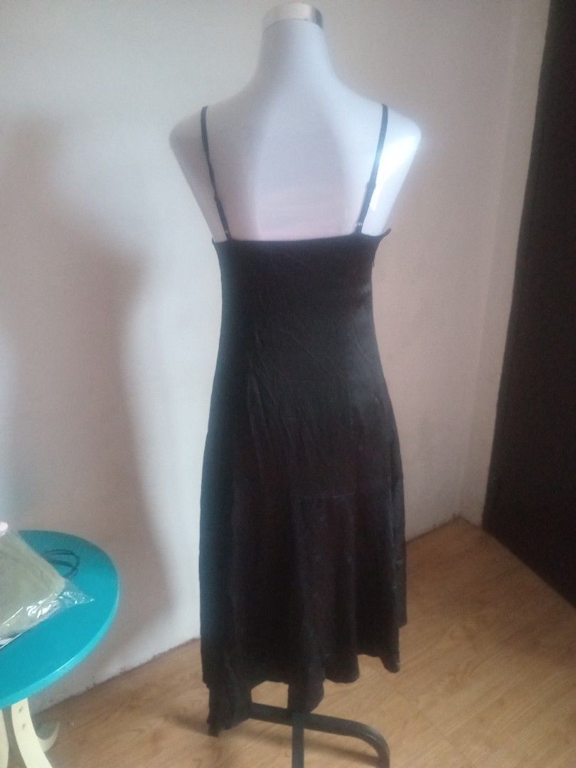 Black Spaghetti Strap Midi Dress with Ruched Bust (Category: Dresses) located in Las Pinas. Submitted by scrappyday (Listing ID 1463570096, Image 3). Description: - Elegant black midi dress - Delicate spaghetti straps - Flattering ruched bust detail - Subtle all-over pattern for added texture - Stylish asymmetrical hemline - Versatile for night outs or formal occasions.