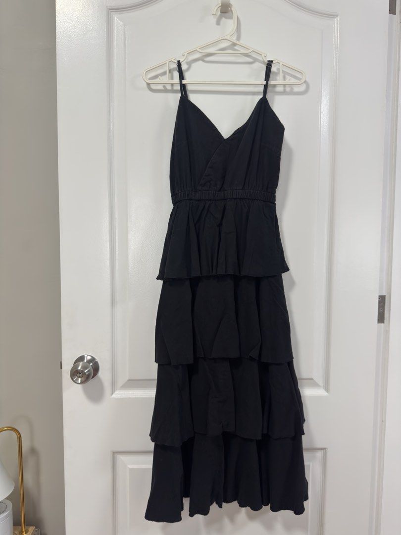 Black tiered midi dress with adjustable straps (Category: Dresses) located in Manila. Submitted by wear.labelle (Listing ID 1463585207, Image 1). Description: 👗 DECLUTTERING MY CLOSET! ✨ Selling some of my clothes that I no longer use. Most of these were only worn once and are still in very good condition. Sayang naman nakatambak lang sa closet, so hopefully someone else can enjoy them! 🥰 • Worn once / rarely worn • Clean and well taken care of