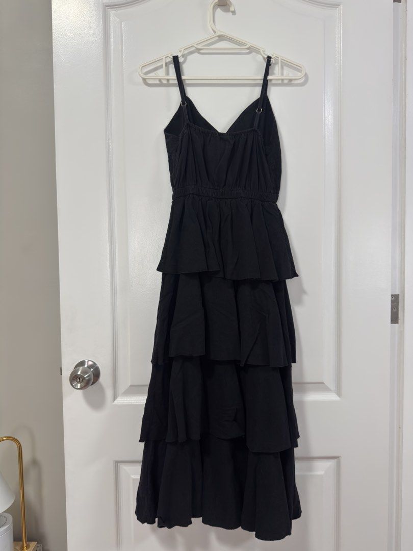 Black tiered midi dress with adjustable straps (Category: Dresses) located in Manila. Submitted by wear.labelle (Listing ID 1463585207, Image 2). Description: 👗 DECLUTTERING MY CLOSET! ✨ Selling some of my clothes that I no longer use. Most of these were only worn once and are still in very good condition. Sayang naman nakatambak lang sa closet, so hopefully someone else can enjoy them! 🥰 • Worn once / rarely worn • Clean and well taken care of