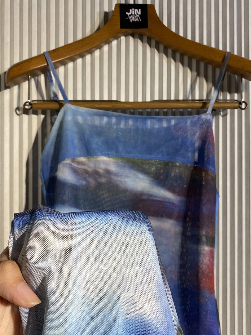 Blue Abstract Print Mesh Slip Dress (Category: Dresses) located in Bocaue. Submitted by jintanthrift (Listing ID 1463650999, Image 3). Description: Mesh abstract/scenery print dress No tags that indicate size but best fits xs-s Adjustable straps . . . y2k, fairycore, cottagecore.