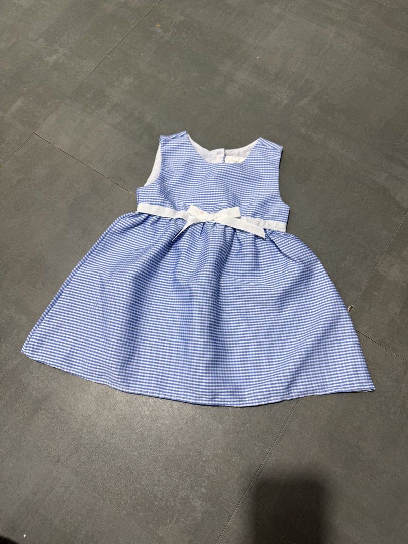 Blue Gingham Baby Dress with White Bow (Category: Babies & Kids Fashion) located in Cavite. Submitted by emeged (Listing ID 1463680419, Image 1). Description: - Adorable blue gingham baby dress - Sleeveless design for comfort - Sweet white bow detail at the waist - Ideal for summer outings or special occasions - Easy to put on and take off - Please check photos for condition and details.