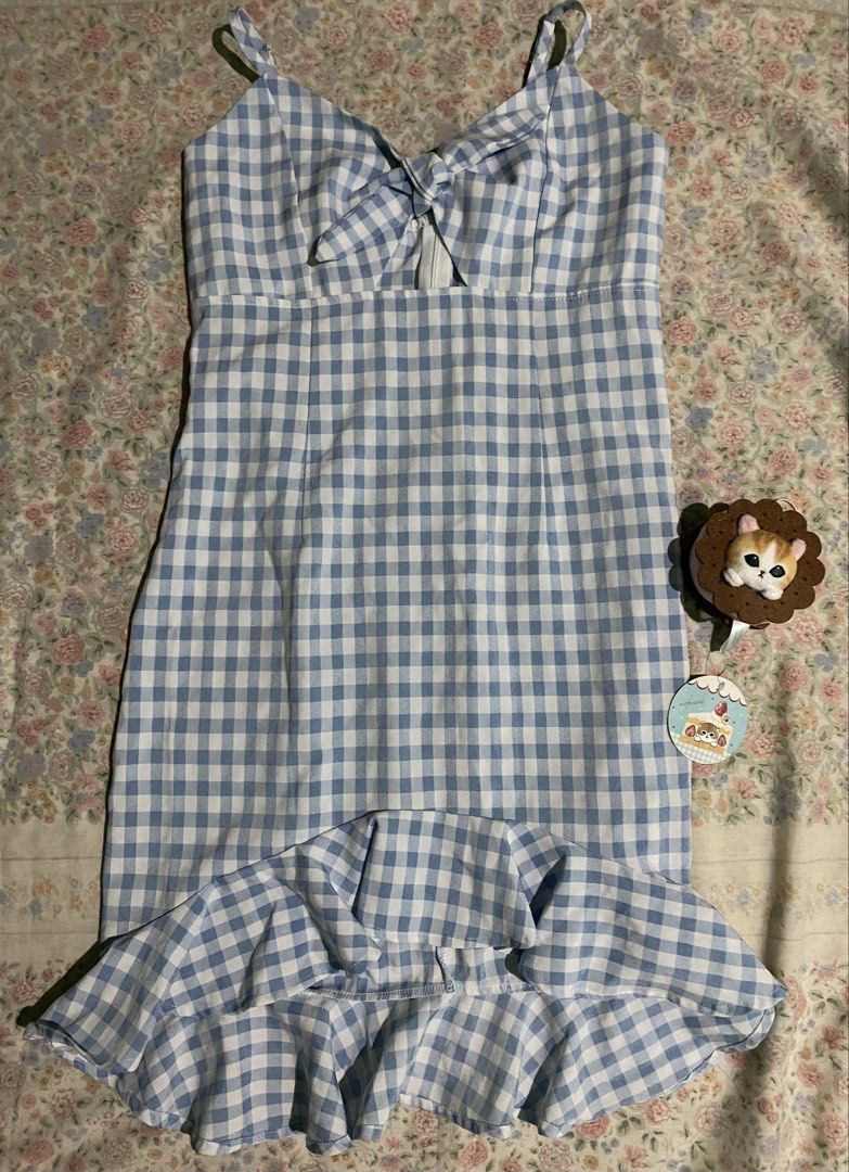 blue gingham tie front dress with ruffle hem (Category: Dresses) located in Manila. Submitted by uncertainly (Listing ID 1463082606, Image 1). Description: 𖦹 good as new 𖦹 S-M 𖦹 mop: GCash 𖦹 mod: jnt, lalamove 𖦹 PM me for more pics/questions ٩(๑❛ᴗ❛๑)۶.
