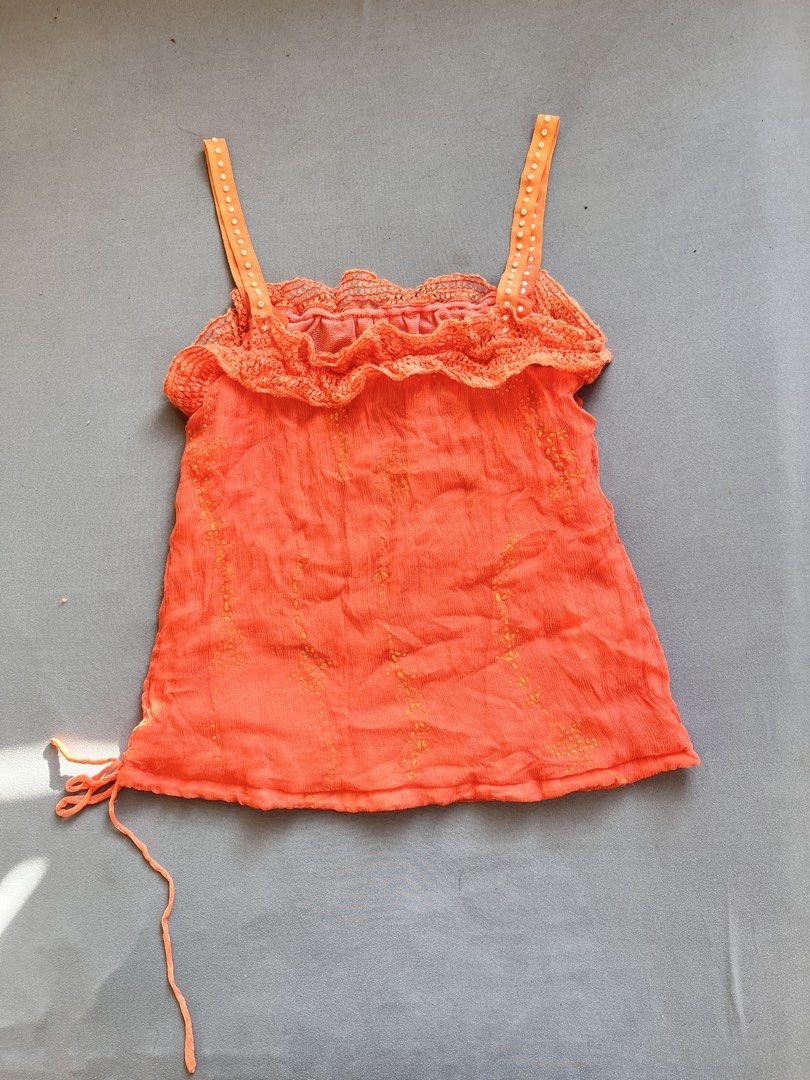 Boho-style crinkle/crinkled camisole top (Category: Sleeveless) located in San Jose. Submitted by thymies (Listing ID 1463648294, Image 1). Description: Can fit Small-Medium Style & Aesthetic: Y2K Boho / Bohemian Cami Top Texture & Fabric: Crinkled / gauze woven fabric with subtle embroidered dot details Neckline & Trim: Crochet lace ruffled neckline Straps: Beaded / sequined ribbon shoulder straps Hem Detail: Side drawstring tie at the bottom co