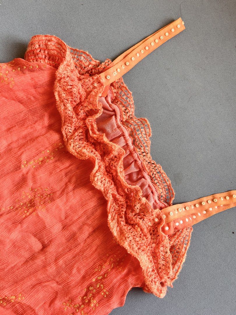 Boho-style crinkle/crinkled camisole top (Category: Sleeveless) located in San Jose. Submitted by thymies (Listing ID 1463648294, Image 3). Description: Can fit Small-Medium Style & Aesthetic: Y2K Boho / Bohemian Cami Top Texture & Fabric: Crinkled / gauze woven fabric with subtle embroidered dot details Neckline & Trim: Crochet lace ruffled neckline Straps: Beaded / sequined ribbon shoulder straps Hem Detail: Side drawstring tie at the bottom co