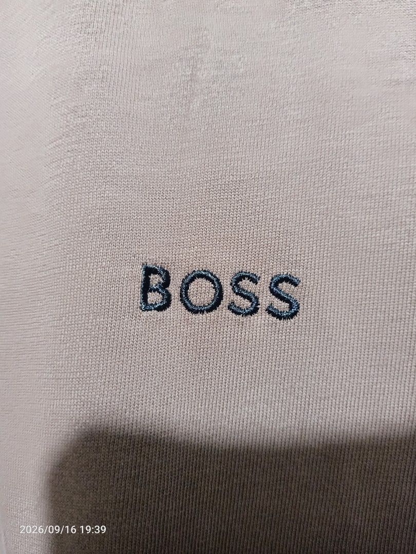 BOSS Mercised T-Shirt Brown (Category: Tshirts & Polo Shirts ) located in Las Pinas. Submitted by OmengSoyT (Listing ID 1463640286, Image 1). Description: - Authentic BOSS T-shirt - Made from premium mercerized cotton - Features embroidered BOSS logo on the chest - Ribbed collar and sleeve cuffs with stylish dark stripes - Brand new with tags attached - Excellent quality material for comfort and durability.