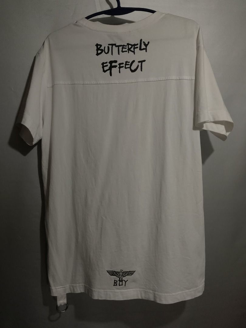 BOY LONDON White Butterfly Effect Graphic Tee (Category: Tshirts & Polo Shirts ) located in Davao. Submitted by 3hunna_thrift (Listing ID 1463663098, Image 2). Description: - White BOY LONDON t-shirt - Size XS - Butterfly graphic on the front - 'BUTTERFLY EFFECT' print across the shoulders on the back - Small BOY logo near the hem on the back - Please check photos for detailed condition.