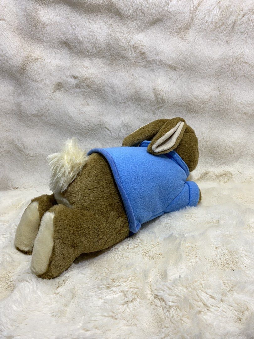 Brown bunny in blue shirt plush (Category: Plushies & Soft Toys) located in Kalibo. Submitted by ollie_stuffshop (Listing ID 1463561523, Image 2). Description: 17cm x 14cm x 34cm Before you send your inquiries: ❗️Last Price is already posted ❗️Manage your expectations, WYSIWYG ❗️May need washing ❗️Dropoff is every Wednesday & Sunday - resembles Peter Rabbit .
