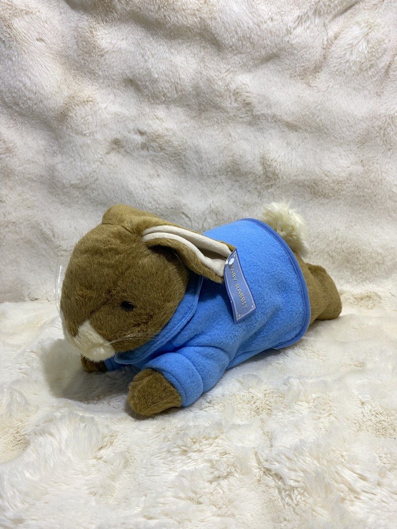 Brown bunny in blue shirt plush (Category: Plushies & Soft Toys) located in Kalibo. Submitted by ollie_stuffshop (Listing ID 1463561523, Image 1). Description: 17cm x 14cm x 34cm Before you send your inquiries: ❗️Last Price is already posted ❗️Manage your expectations, WYSIWYG ❗️May need washing ❗️Dropoff is every Wednesday & Sunday - resembles Peter Rabbit .
