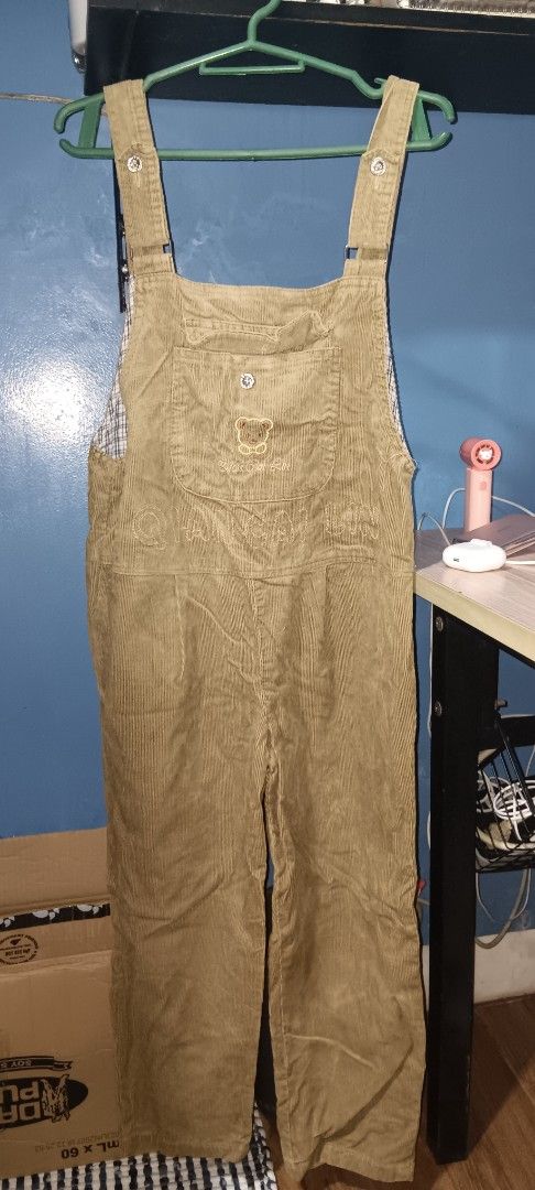 Brown Corduroy Overalls with Bear Embroidery (Category: Other Bottoms) located in Quezon City. Submitted by piplise (Listing ID 1463717340, Image 1). Description: - fits S-M - brown corduroy with brown embroidery, front pocket, no pockets on the legs thought had it altered because it eas too big for me at that time. -price negotiable - Lined with a classic plaid pattern - semi-adjustable straps - good for summer with sleeveless or tanktops and ev