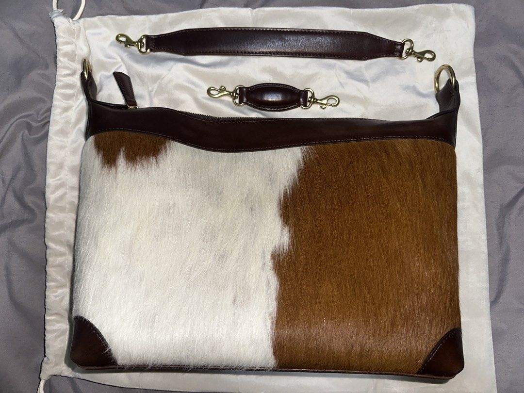Beatriz in Natural (Talao Studios) (Category: Luxury Bags & Wallets) located in Paranaque City. Submitted by jessicalaurice (Listing ID 1463588007, Image 3). Description: Talao Studios Beatriz in Natural -3-in-1 design: pouch, top handle, or shoulder bag -Statement cowhair front with rich leather body -Timeless silhouette with modern functionality Bag Dimensions: Width: 15” Length: 12” Depth: 4.5” Strap Details: Top handle length: 3” Shoulder str