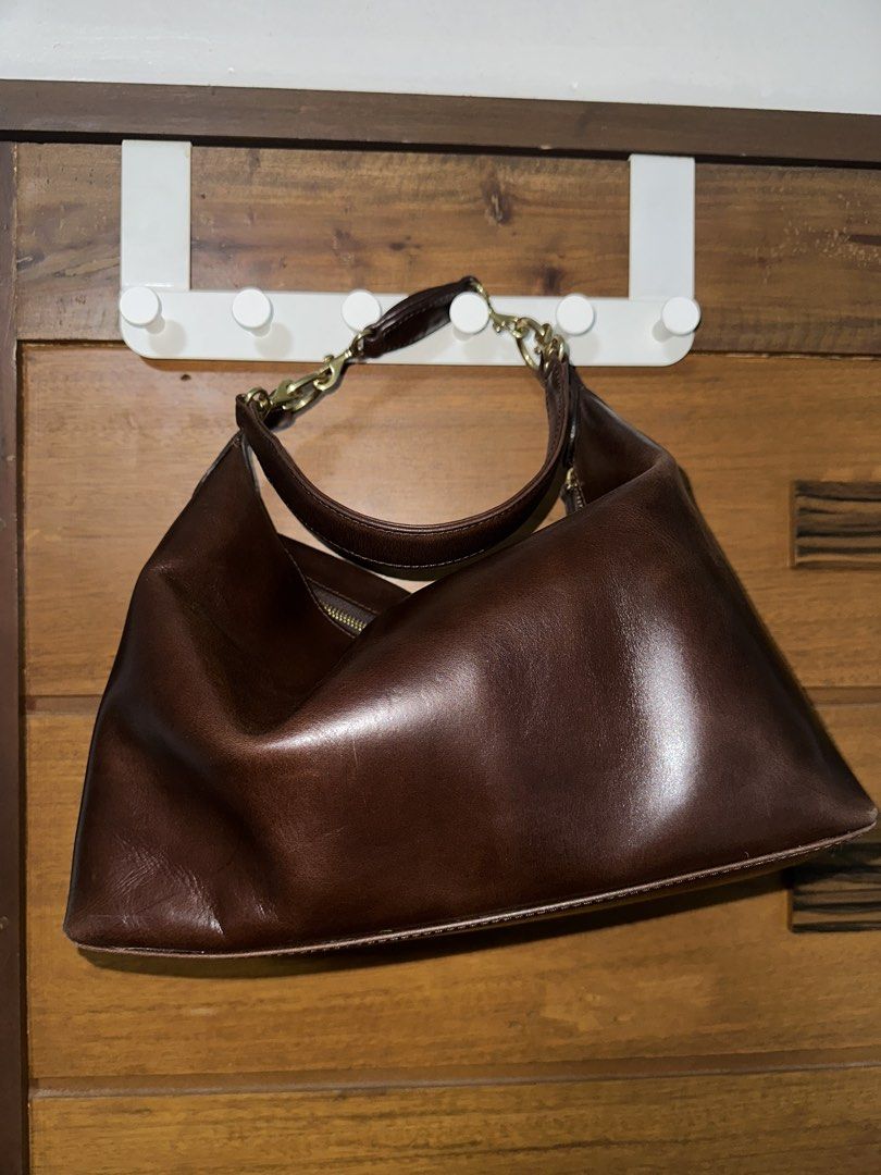Beatriz in Natural (Talao Studios) (Category: Luxury Bags & Wallets) located in Paranaque City. Submitted by jessicalaurice (Listing ID 1463588007, Image 2). Description: Talao Studios Beatriz in Natural -3-in-1 design: pouch, top handle, or shoulder bag -Statement cowhair front with rich leather body -Timeless silhouette with modern functionality Bag Dimensions: Width: 15” Length: 12” Depth: 4.5” Strap Details: Top handle length: 3” Shoulder str