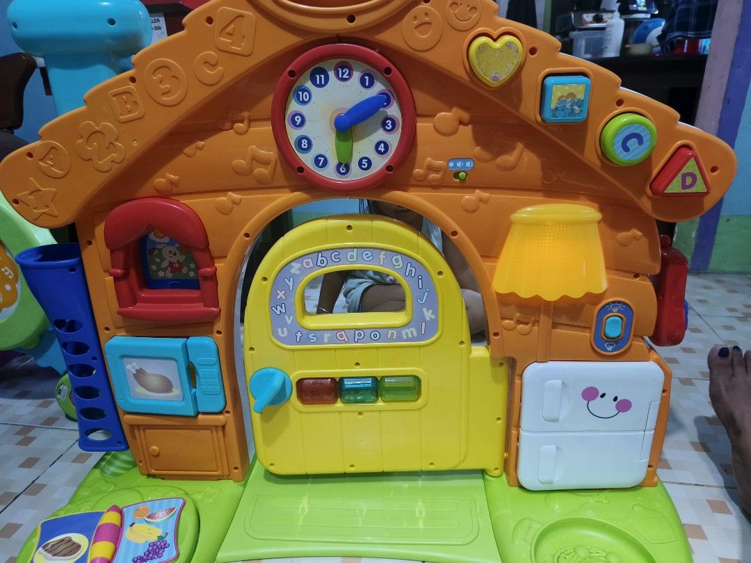 Bruin Lights & Sound House Playset (Category: Kids Toys) located in Caloocan City. Submitted by mckysprelove (Listing ID 1463592496, Image 2). Description: - Bruin Lights & Sound House playset - Interactive buttons and sounds for engaging play - Features a clock, alphabet door, and basketball hoop - Comes with balls and other accessories - Ideal for toddlers learning and having fun Bruin Double-Sided Playable! Light & Sound House Tested and worki