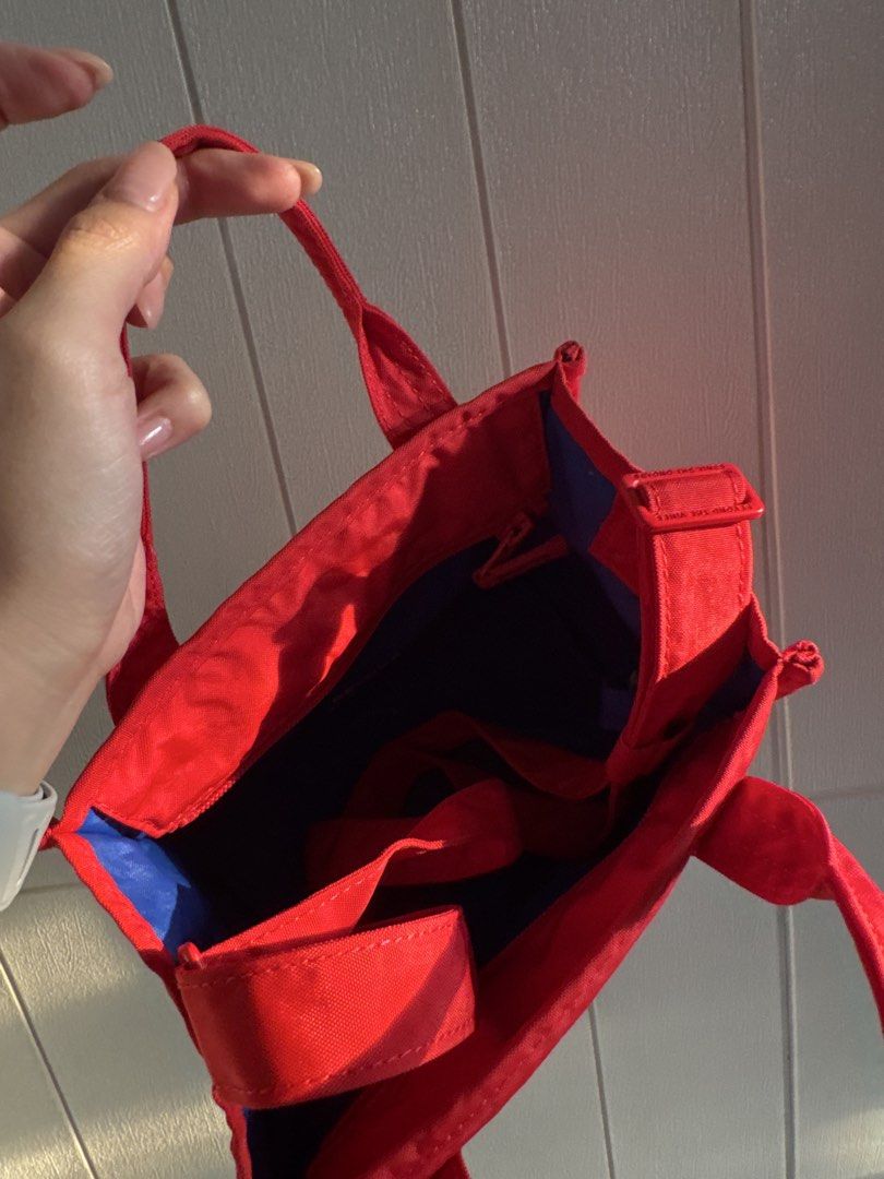 BTV bag (Category: Tote Bags) located in Quezon City. Submitted by summerisa (Listing ID 1463643206, Image 3). Description: - Cute red canvas tote bag - Handy front pocket with zipper closure - Blue fabric lining inside - Perfect size for daily essentials - Easy to carry with top handles - Great for errands or casual outings.
