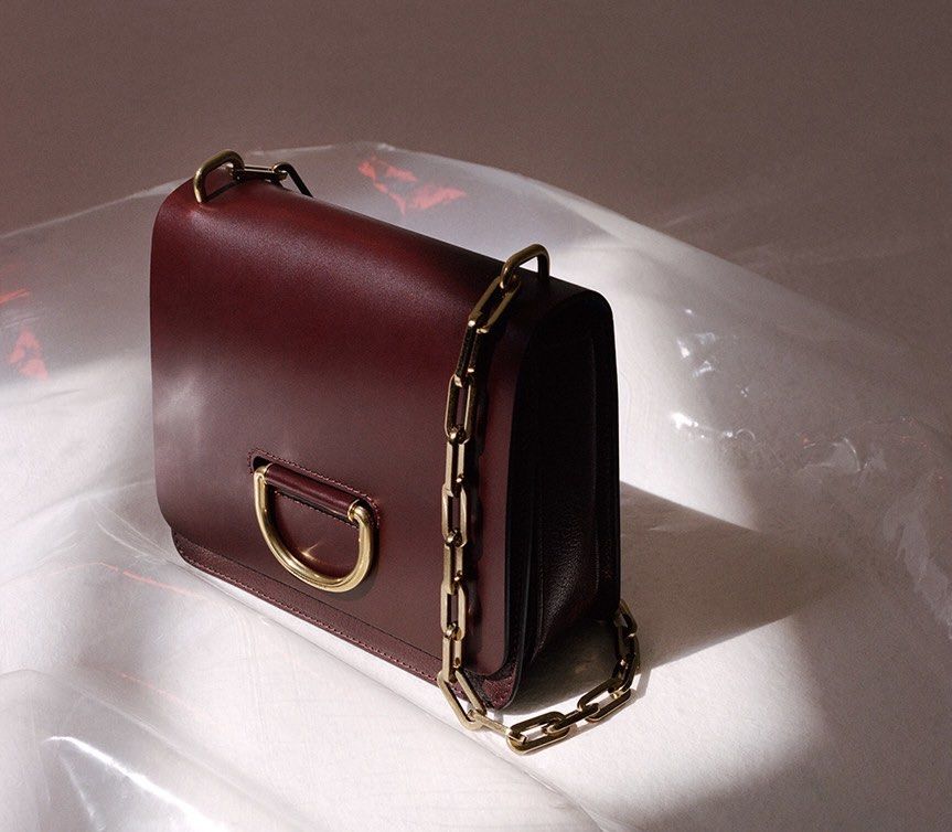 Burberry D-Ring Leather Crossbody Bag (Category: Luxury Bags & Wallets) located in General Trias. Submitted by lexluxebizz (Listing ID 1463613289, Image 2). Description: Burberry D-Ring Leather Crossbody Bag Made in Italy. (Original Price: Php 165,000++) THE DETAILS Highlights - Leather - Fold -over top - Flip-lock fastening - Partitioned compartment - Internal patch pockets - Gold-tone Hardware - Condition: EXCELLENT, like NEW. This previously o